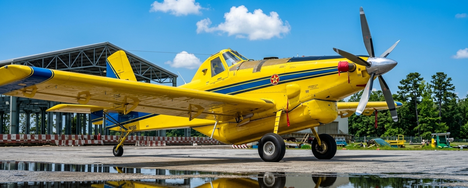 Yellow FuelBoss aircraft on an airport apron